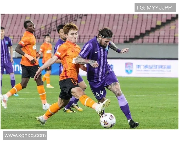 广州恒大战胜上海申花，继续领跑中超积分榜，保持不败纪录